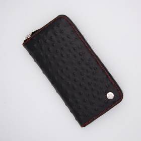 Compagnon zippé en cuir façon autruche noir rouge .