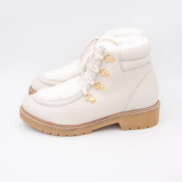 Bottines montantes mouton écru écru .